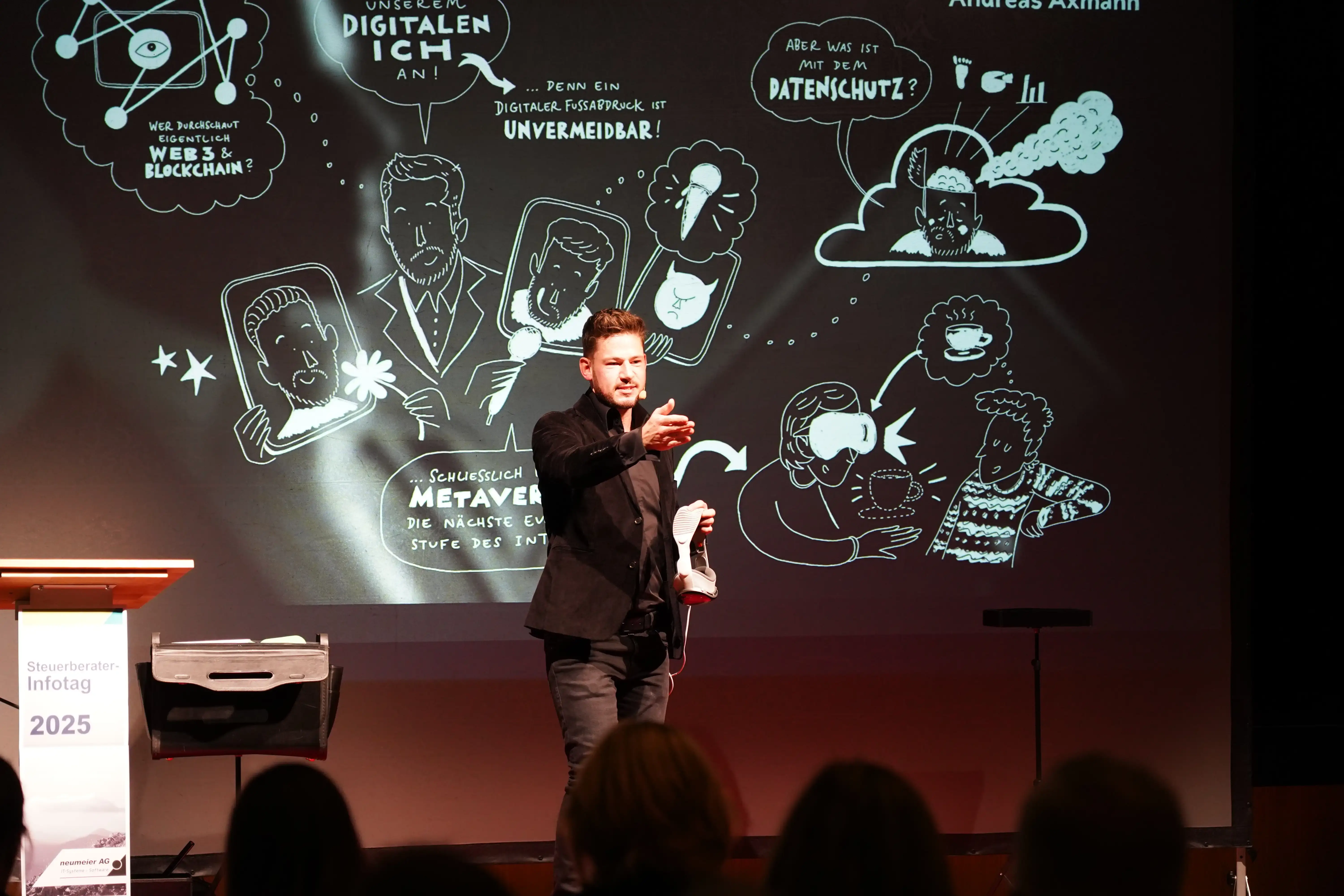 Andreas Axmann verzauberte die Gäste mit seiner einzigartigen Kombination von Realität und Digitalem. Auf der Bühne benutzte er hierfür Technologien wie VR-Brillen und Tablets.